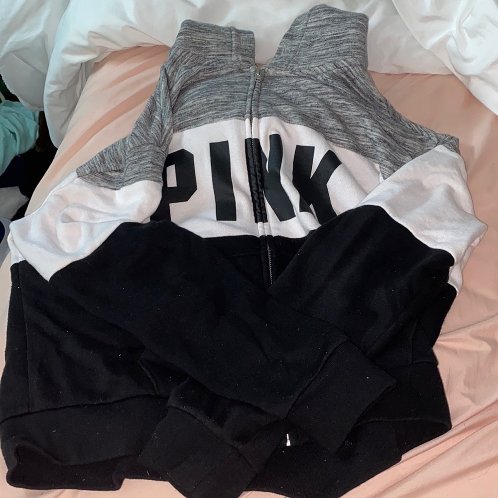 Cute Victoria Secret zipped up sweater.